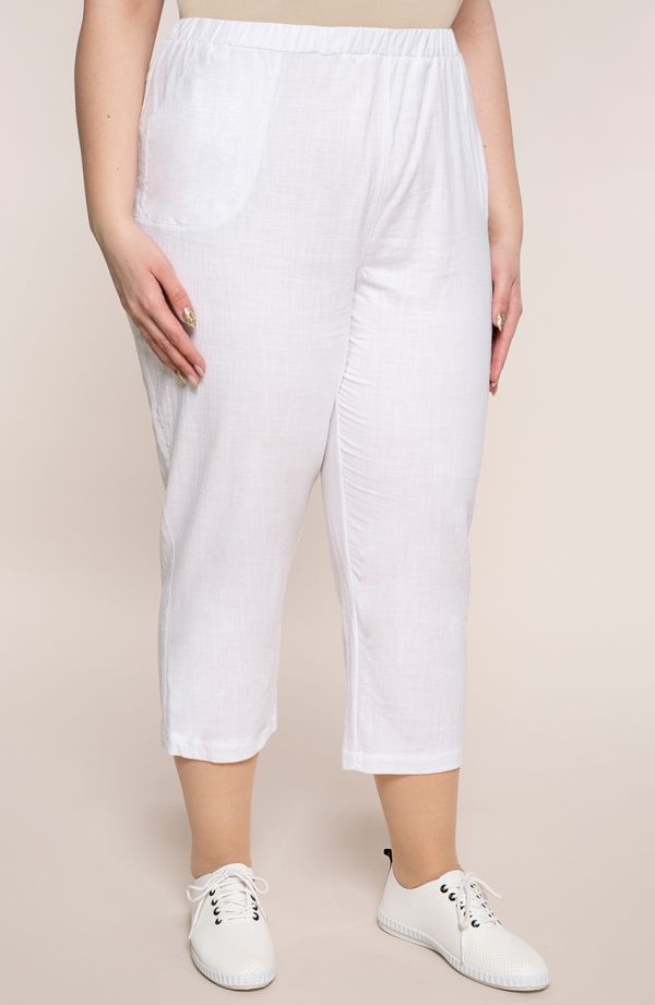 Bawełniane spodnie plus size 7/8 w białym kolorze